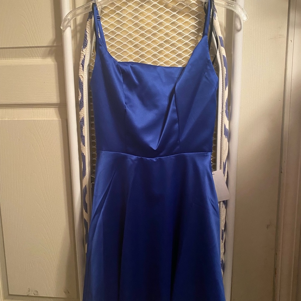 New,never worn,tagged royal blue sz 1/2 Juniors strappy above knee length dress.